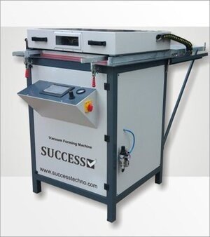 Vacuum Forming Machine